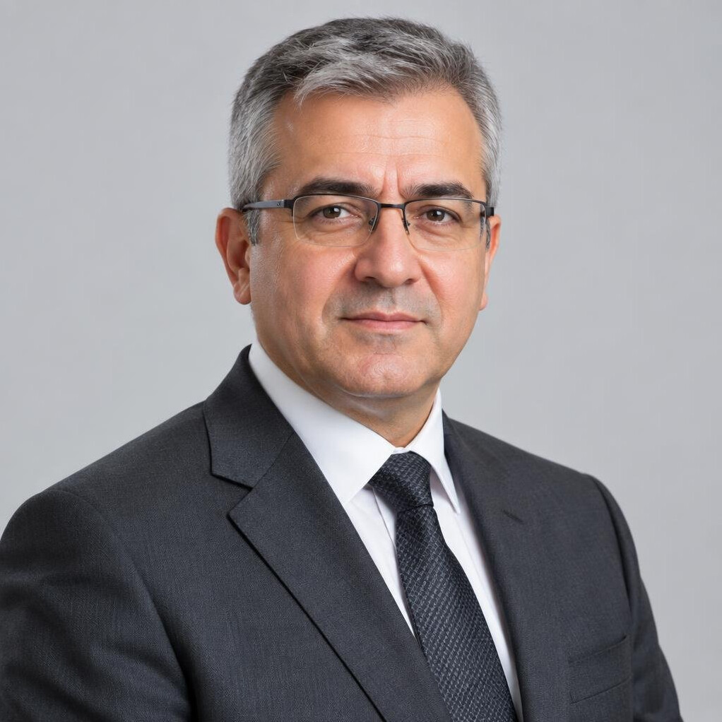 Portrait of a Turkish man in his 50s with gray hair
