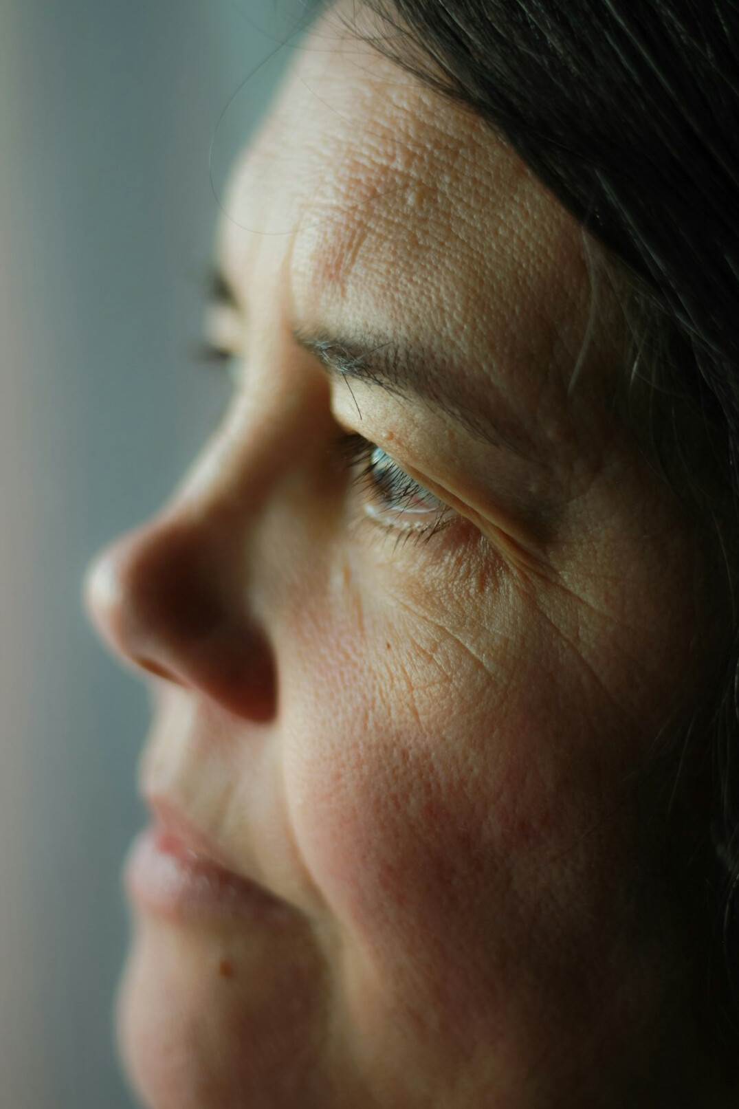 Portrait of a Turkish woman in her 40s with shoulder length hair